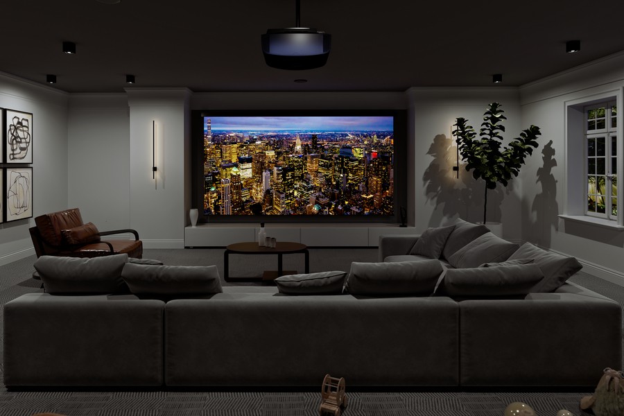  A luxurious home theater setup featuring a large projection screen and comfortable seating for an immersive audiovisual experience.