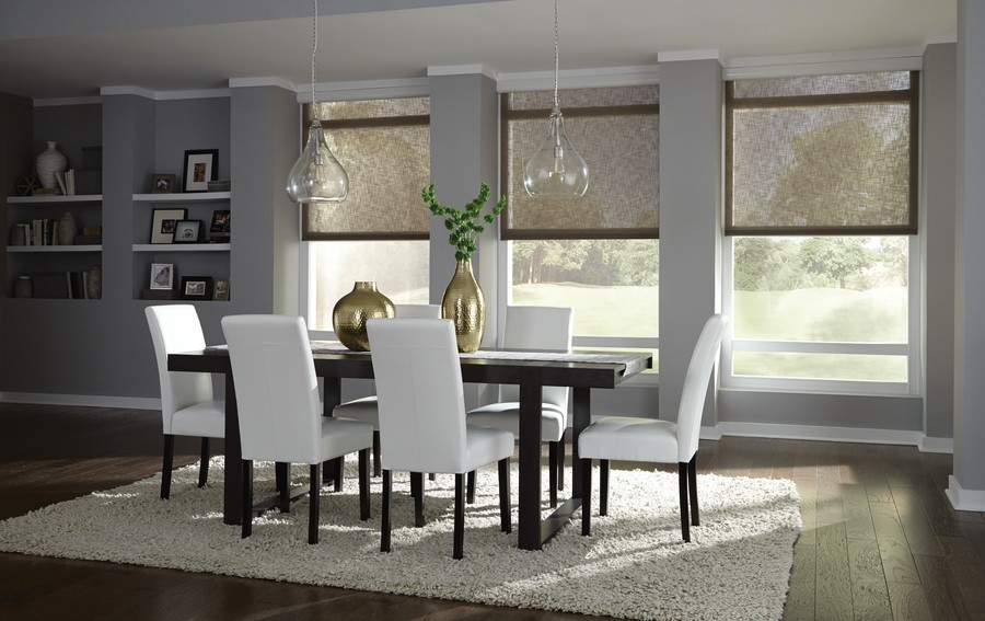 Dining room with Lutron motorized shades lowered halfway. 