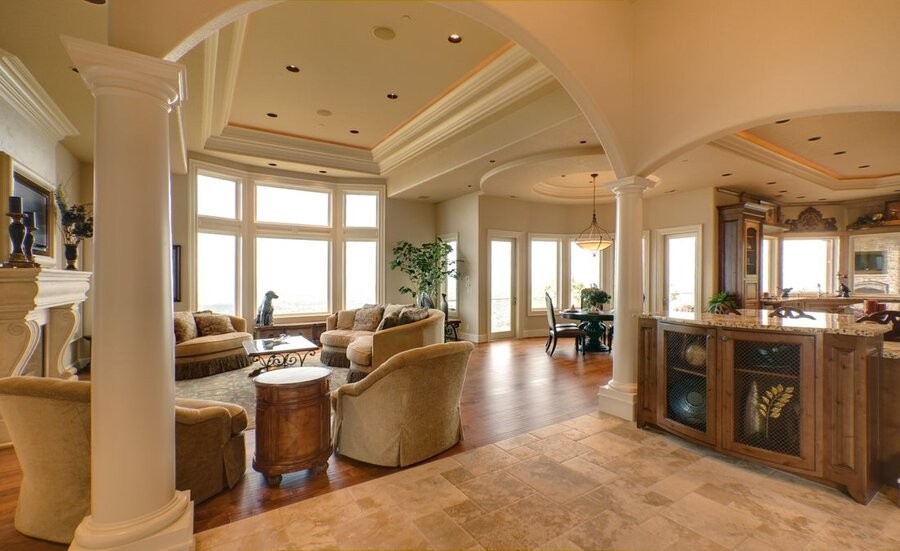 An open living space featuring in-wall speakers as part of a whole-home audio system.